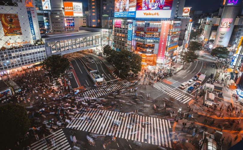 the lights of the streets at night are turned on in a crosswalk