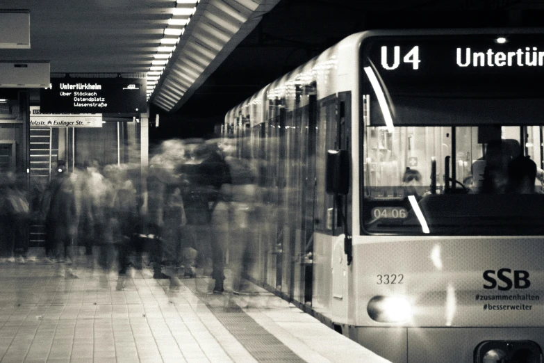 black and white pograph of a subway platform