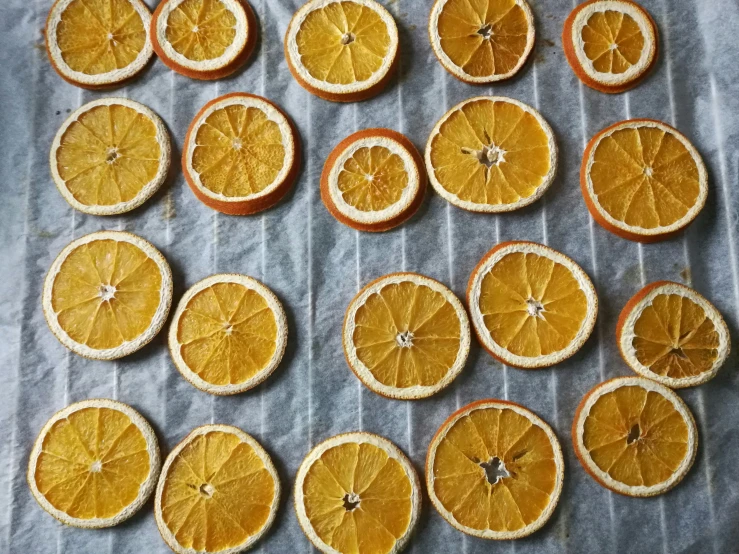 a group of orange slices with little white dots