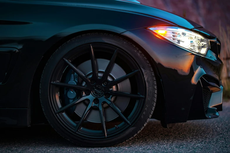 a close up of the front end of a sports car