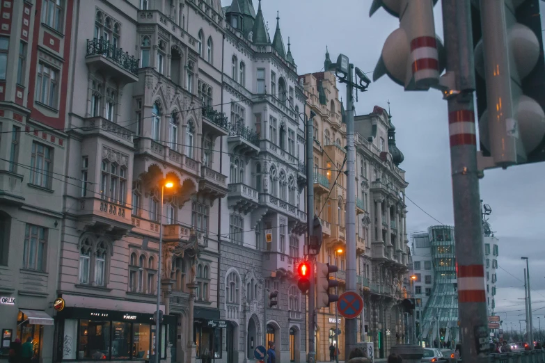 a city street is busy with traffic lights