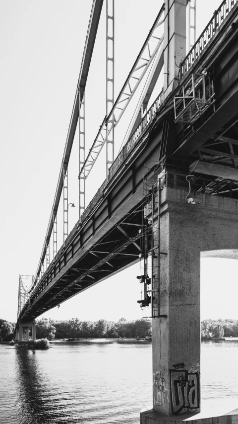 a bridge is over water with no cars on it