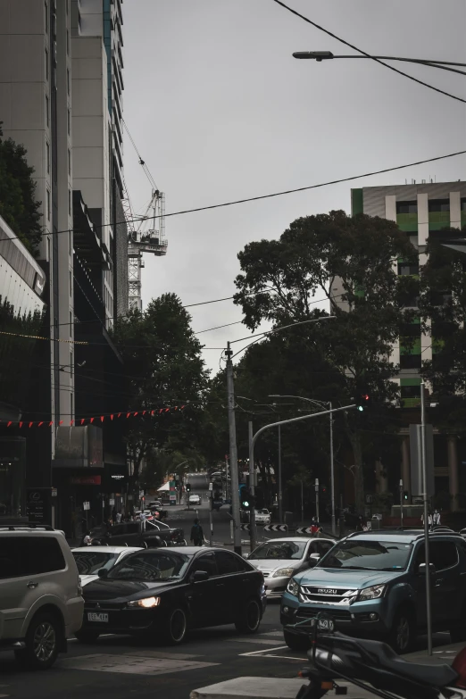 many cars and motorcycles are on the street