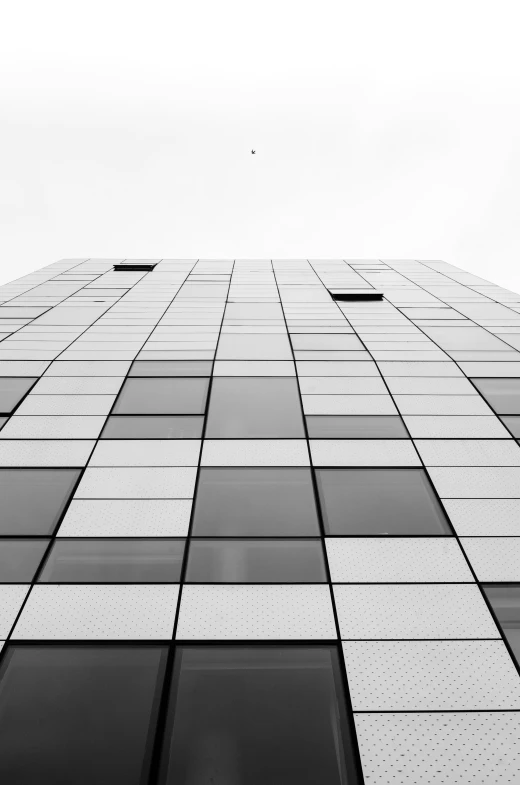 a black and white po of a very tall building