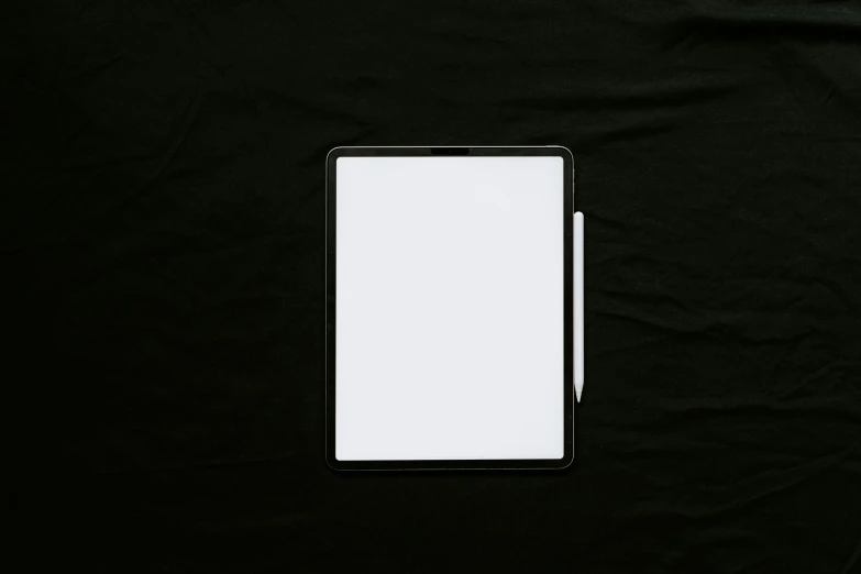 a computer screen on a black cloth