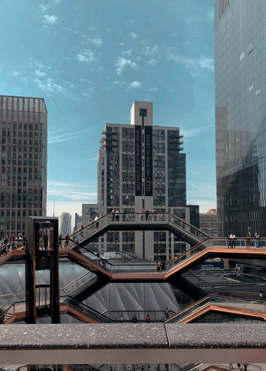 a bridge and some tall buildings on the water