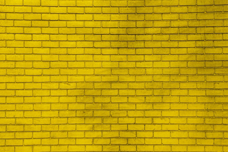 yellow wall with bricks textured by black lines
