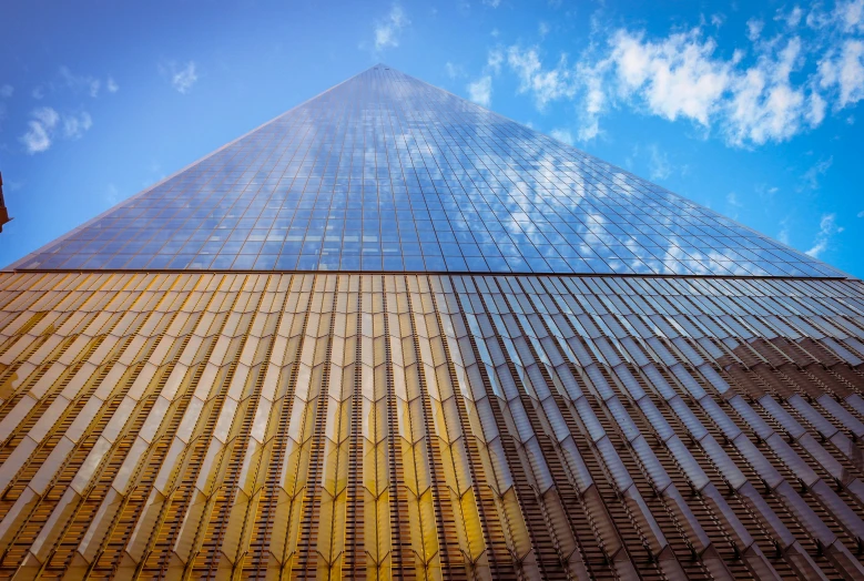 view from ground looking up at a very tall building