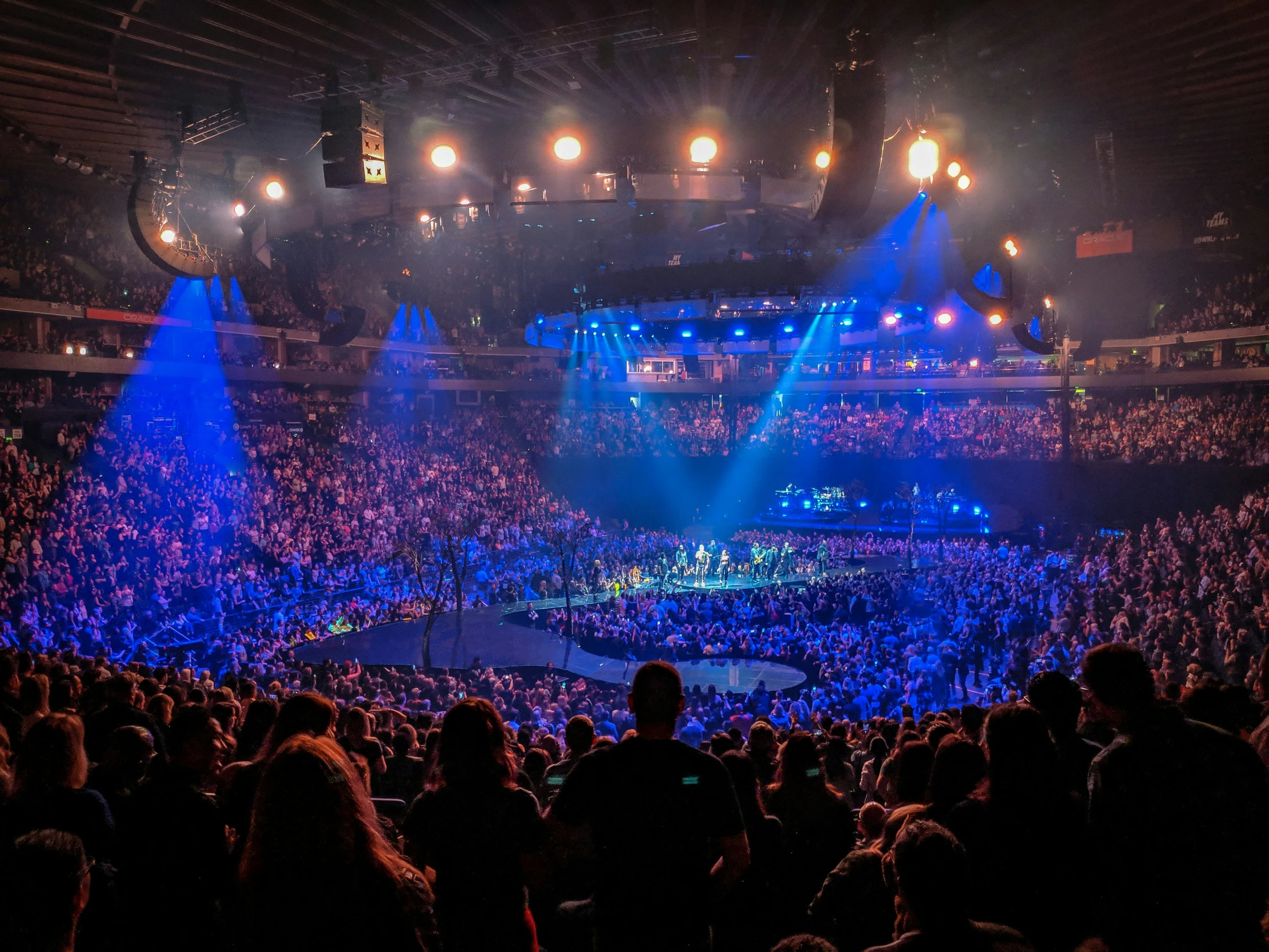 large arena with many people at a concert