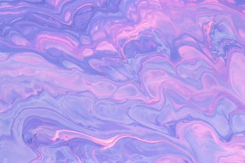a colorful texture of paint painted in purple and pink