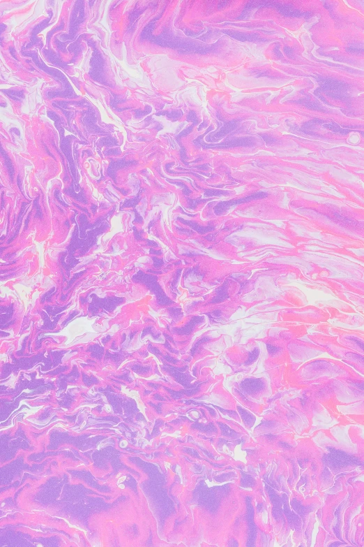 the surface of a marbled pink, orange and pink wallpaper