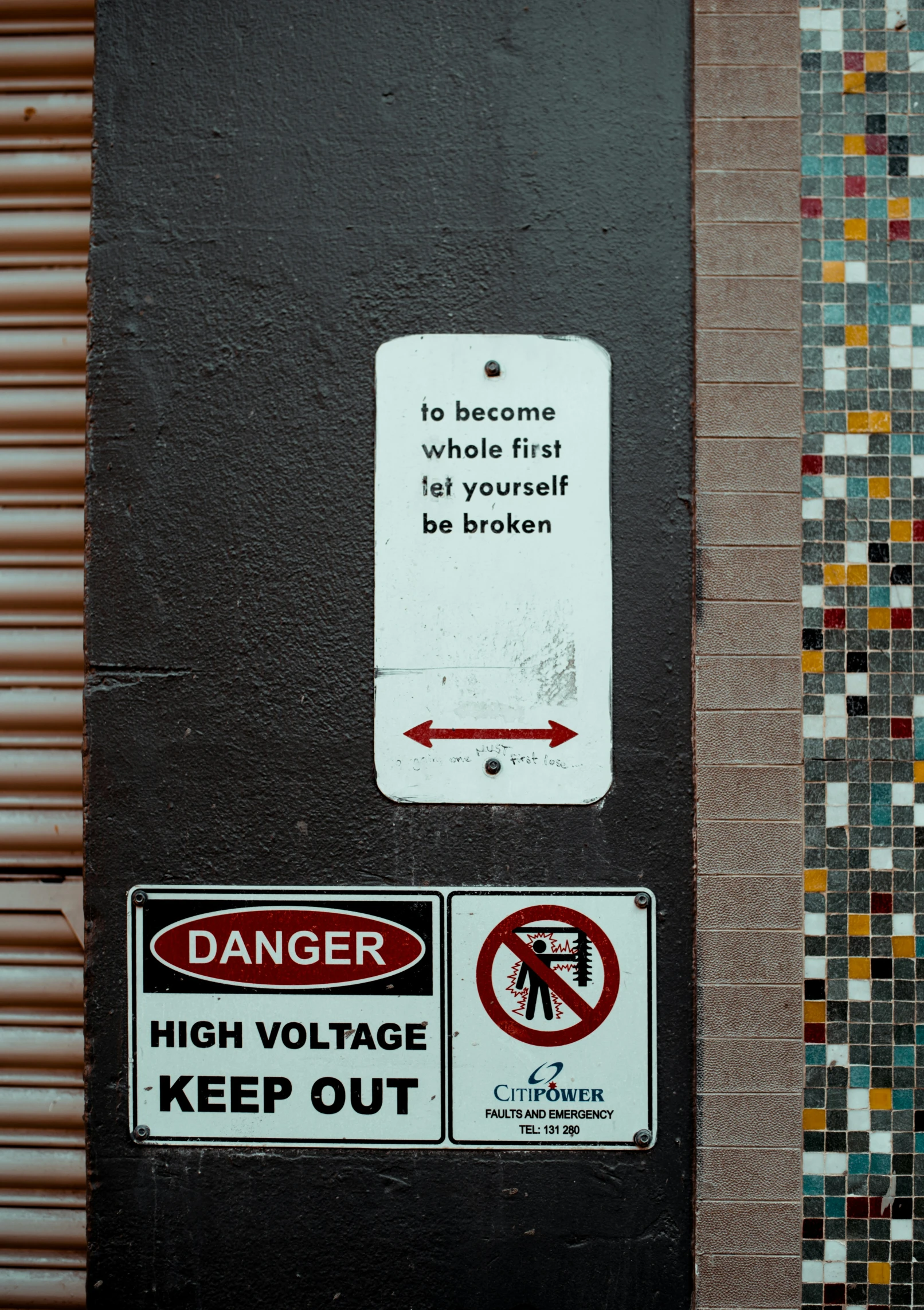 various signs and warning signs on a building