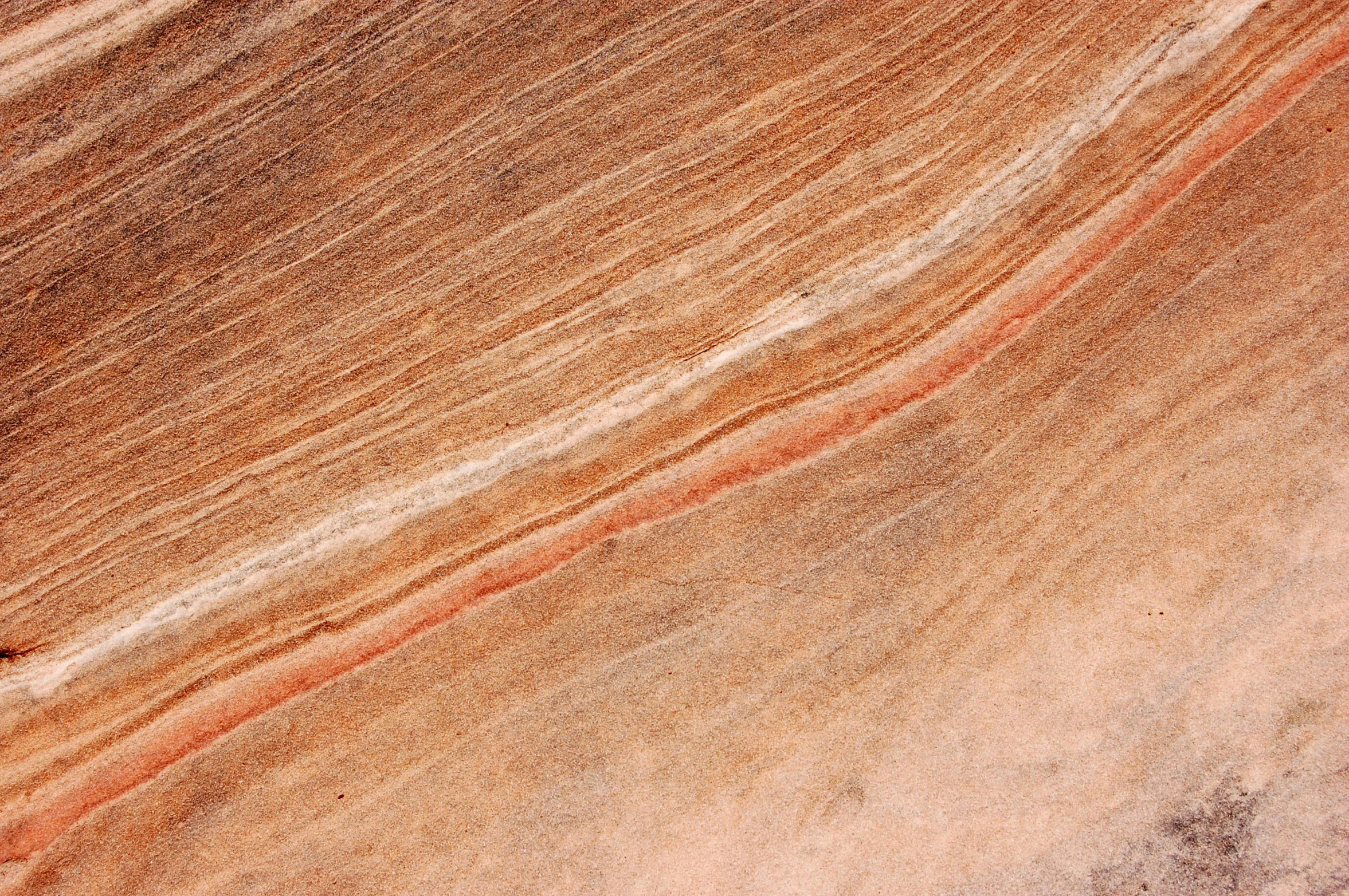 a close up po of a piece of wood with streaks and s