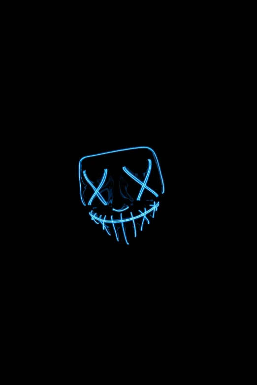 neon colored neon mask against black background