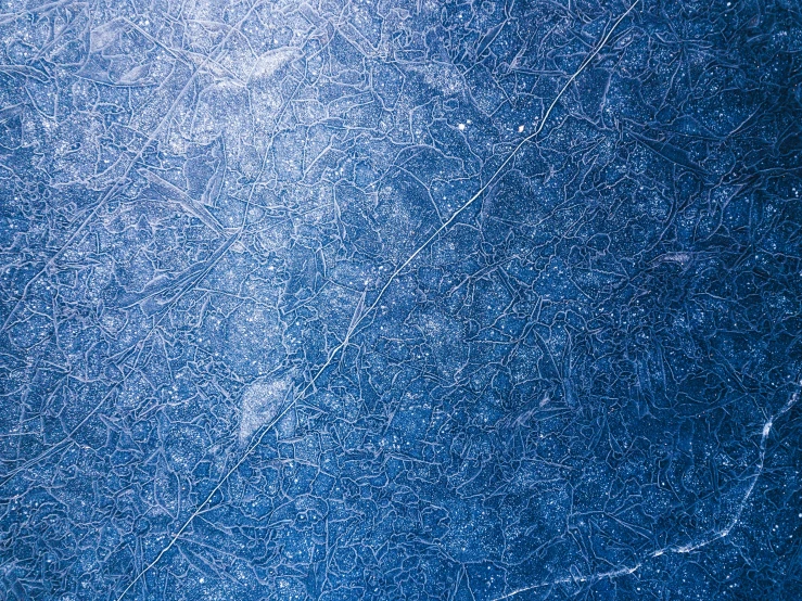 a close up po of a blue paint wall