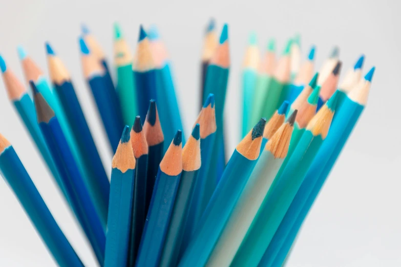 the blue and orange pencils have been used to draw