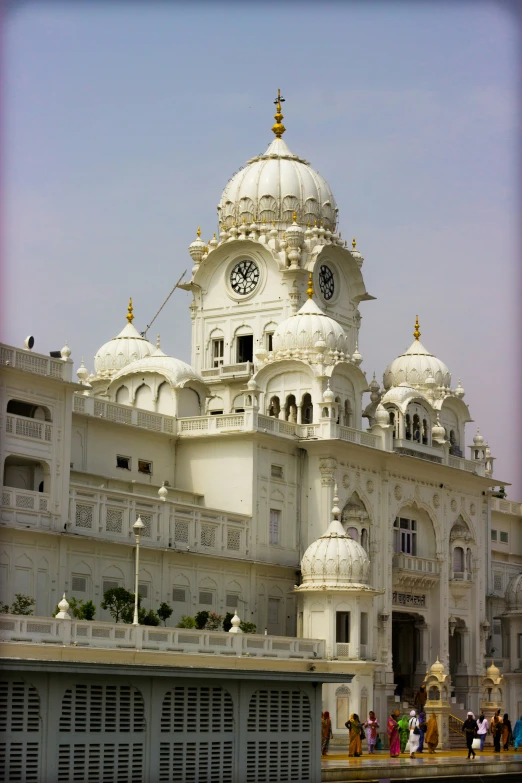 a building with two clock on the front