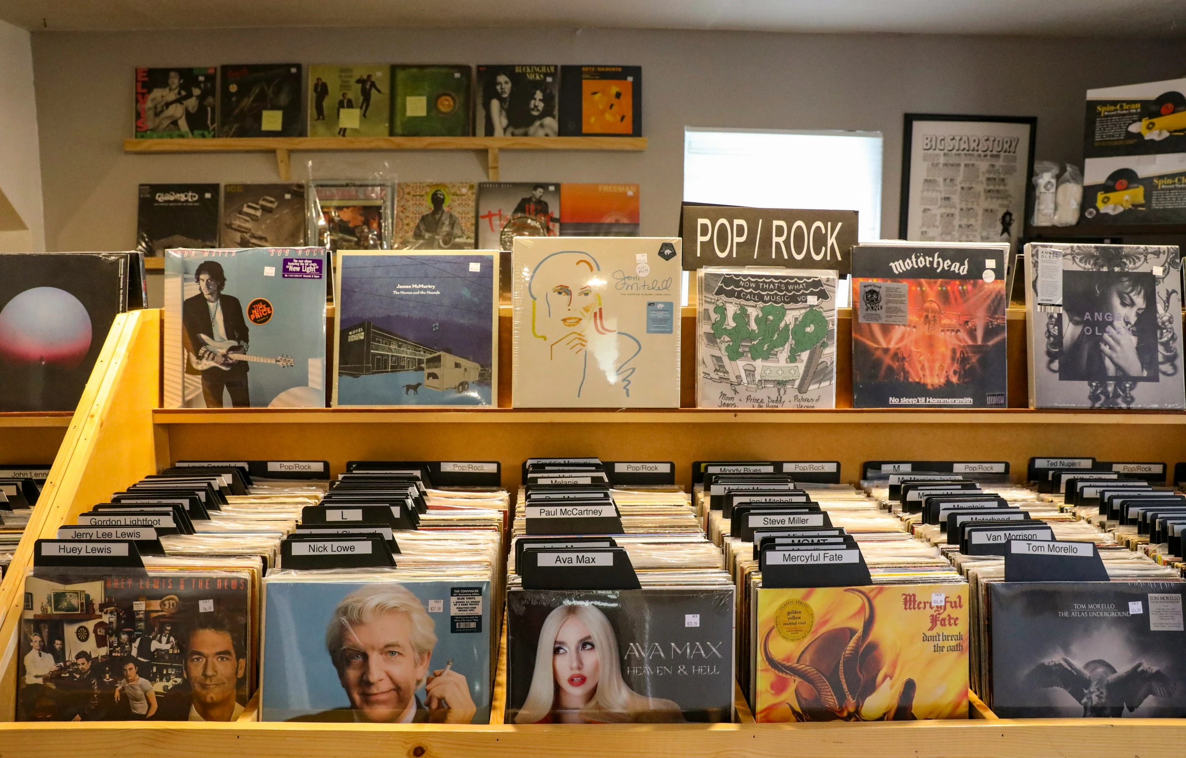 a display in a music store full of records