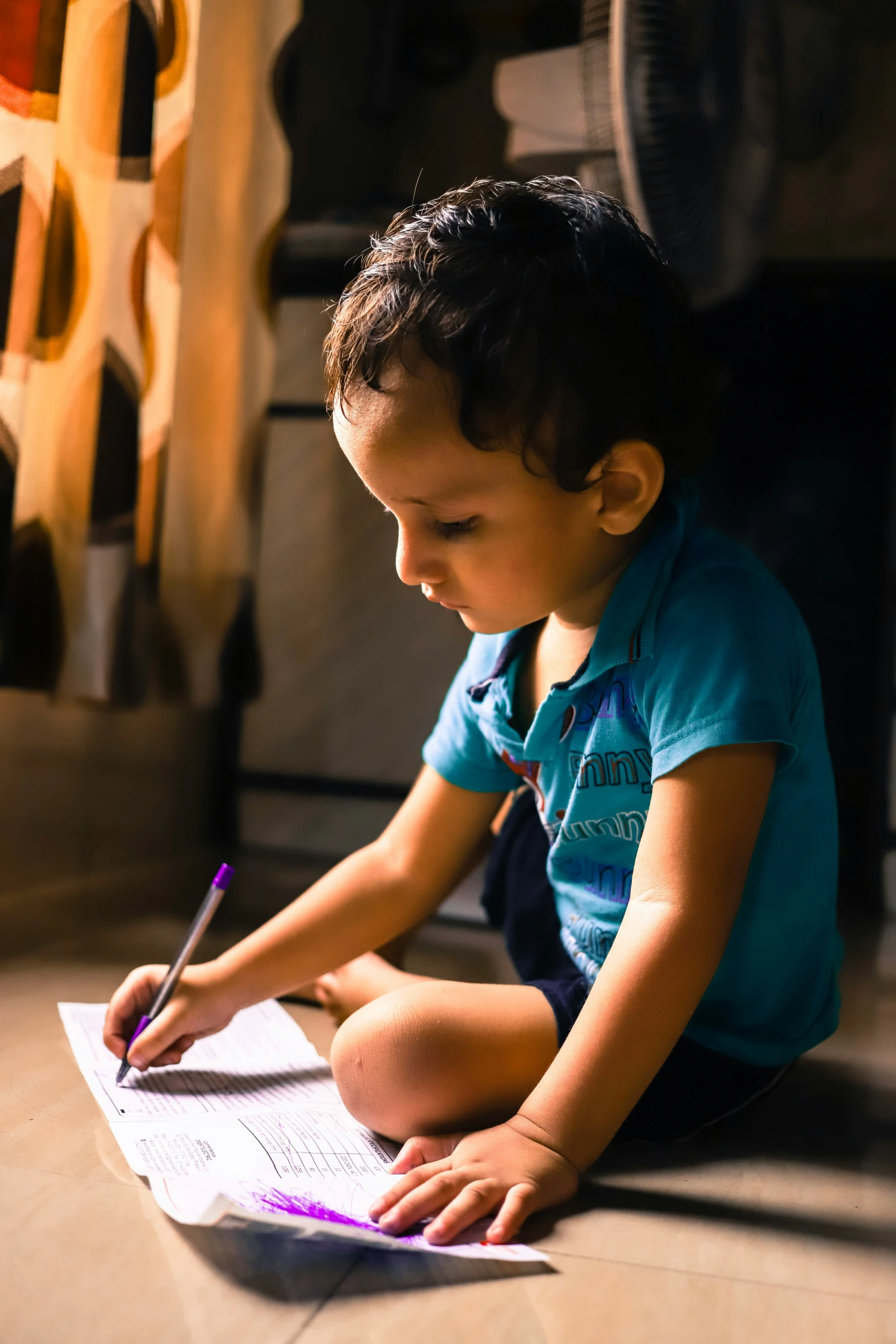 a  is writing on a piece of paper