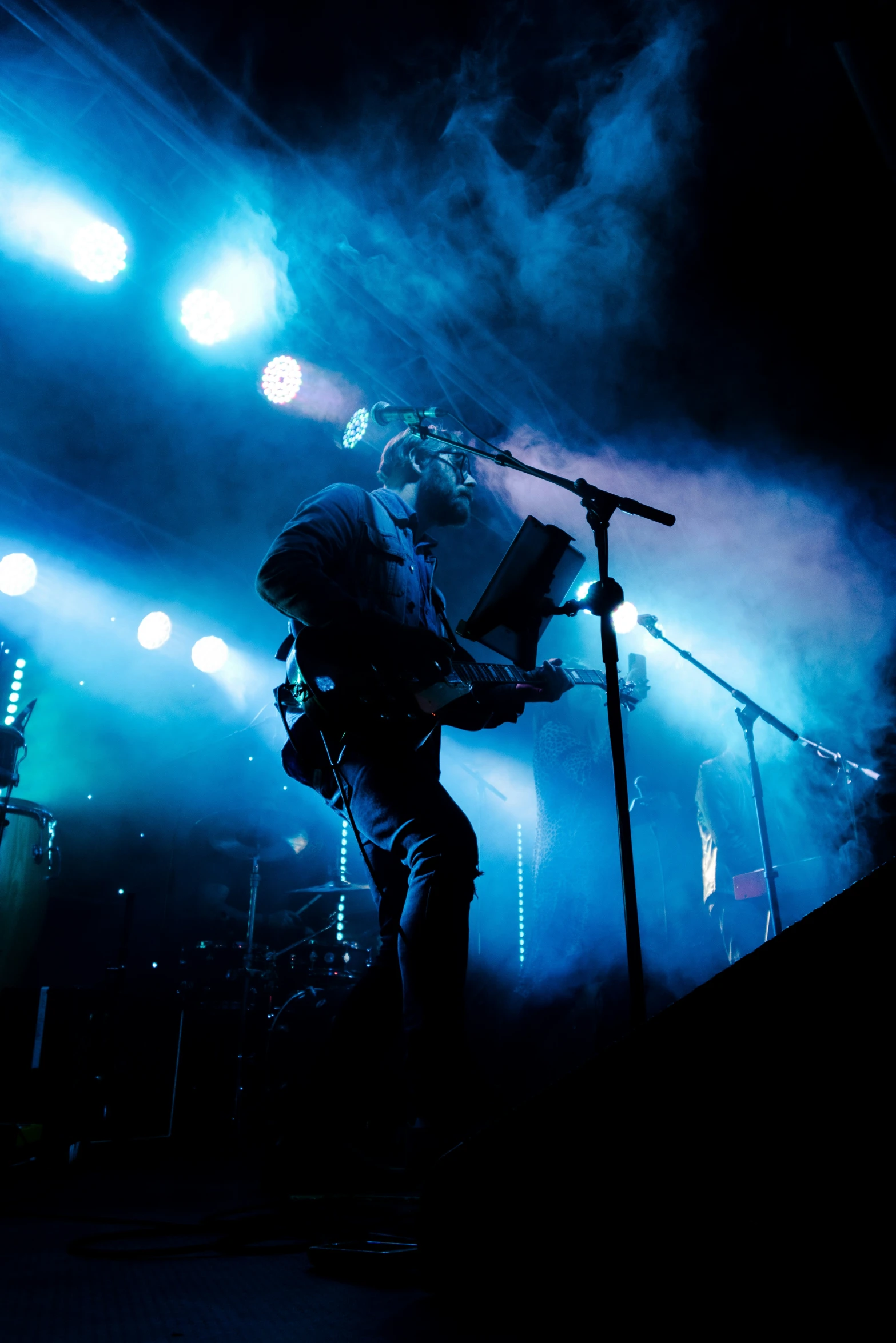 a person playing a musical instrument on stage