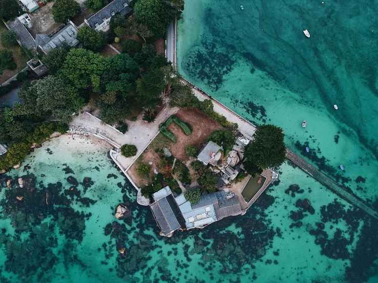 an aerial view of a town in the water