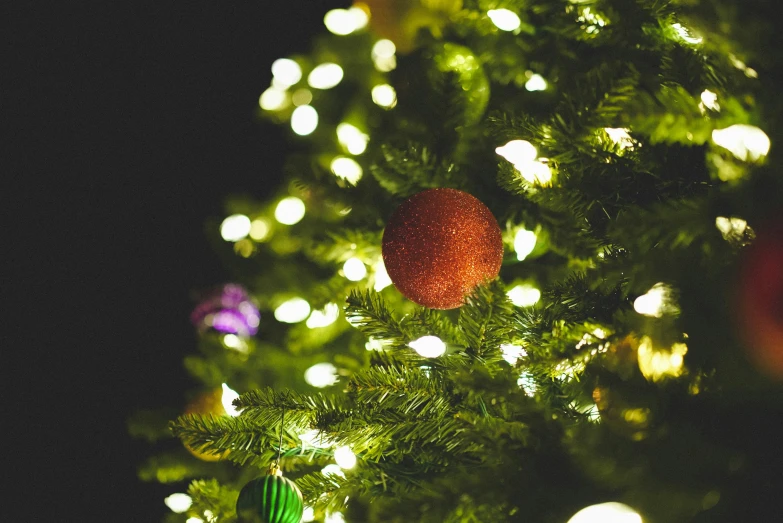 a close up of a green christmas tree