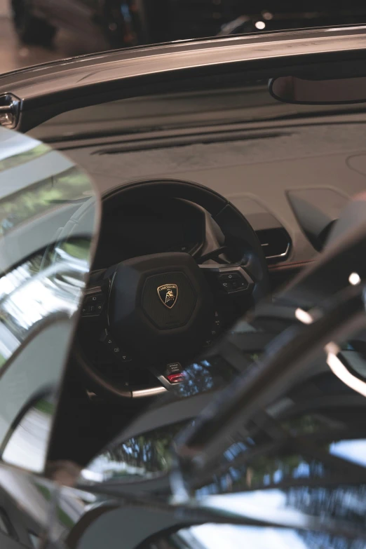 a car with an automatic clock and leather steering wheel