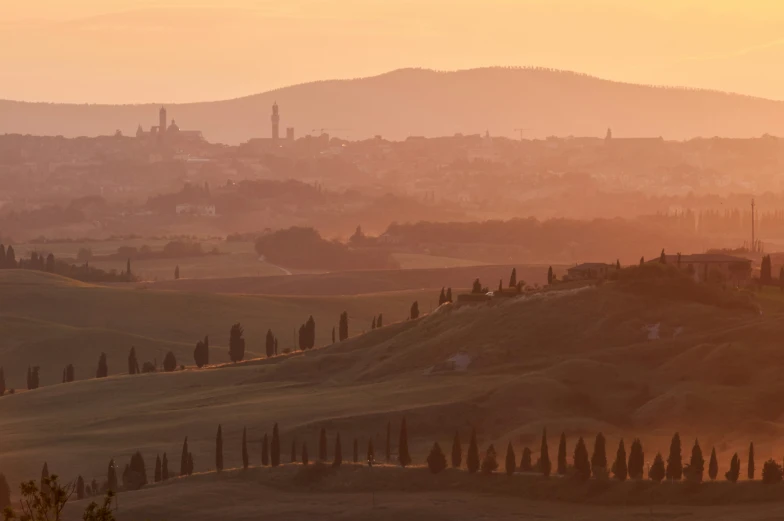 a view of the rolling countryside in italy