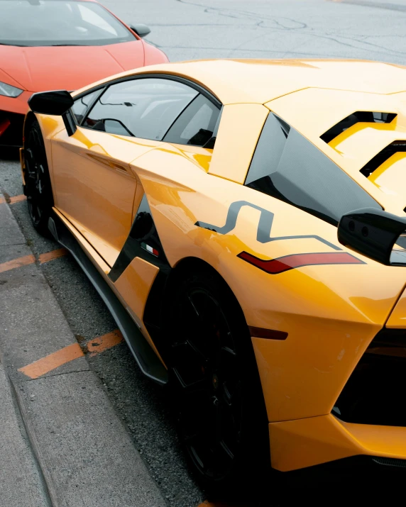 a pair of cars parked next to each other