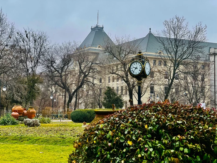 a clock tower and the entrance to an old style house