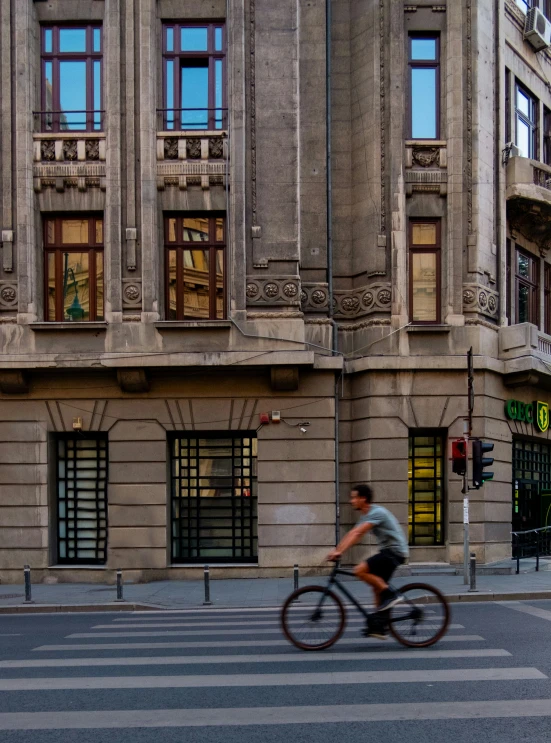 a man riding a bike on the street