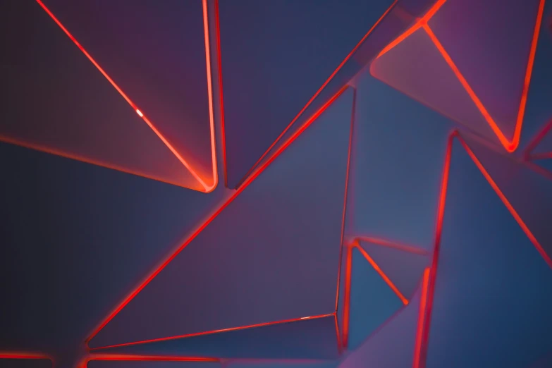 a blue background with a small group of bright red lights