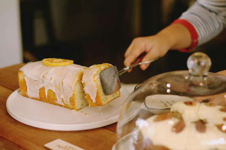 someone is decorating some kind of cake on a plate