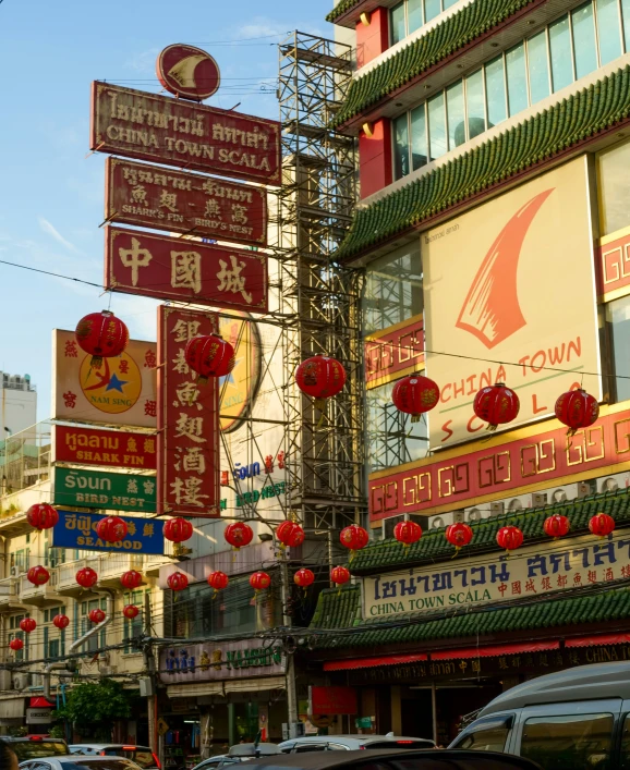 oriental signs displayed outside of business buildings in asia