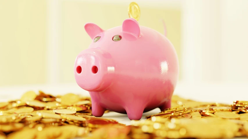 a piggy bank with golden coins on it