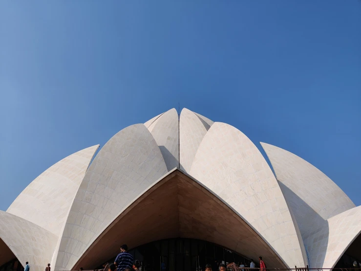 a large building with a crowd on the outside of it