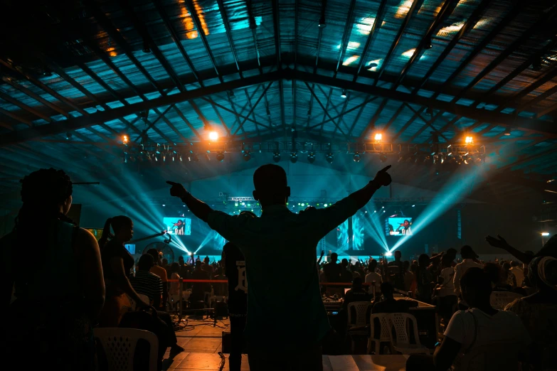 a person in an arena with some lights on