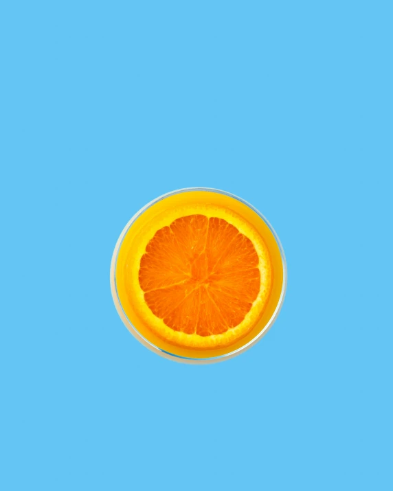 a half a orange is seen in the sky