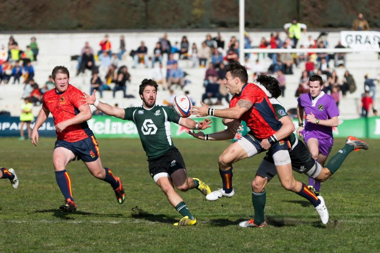 a group of rugby players playing a game