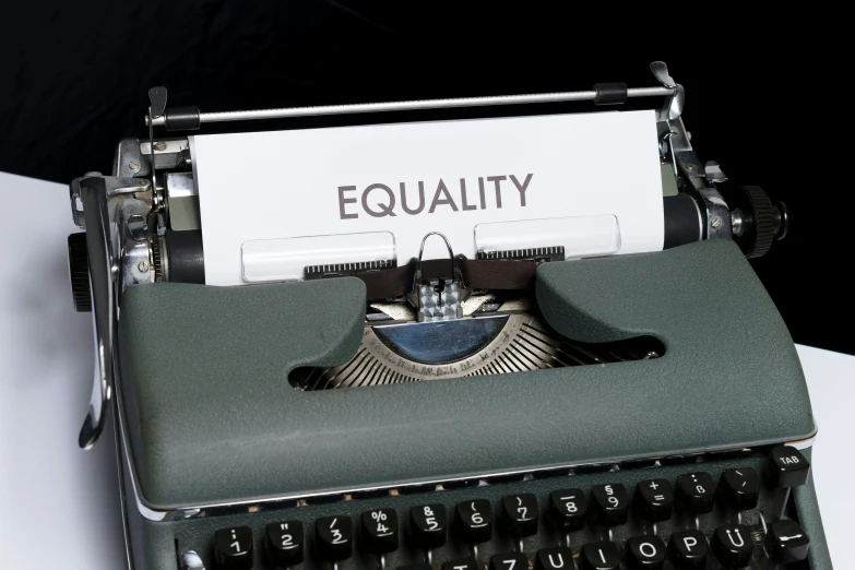 an image of a typewriter that reads equality