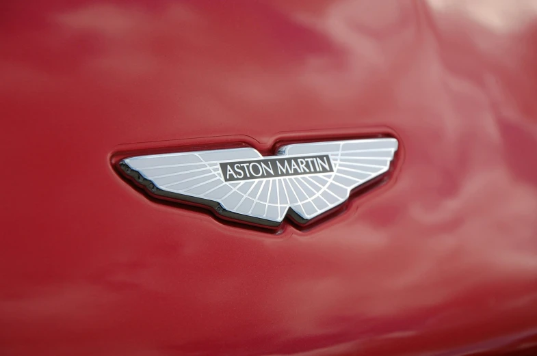 the emblem on a red car is shown