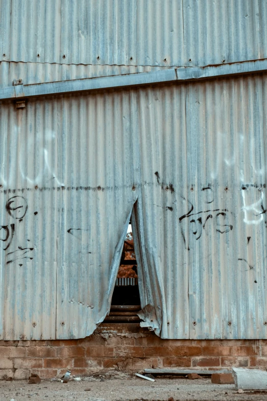 some graffiti is written on the walls of a building