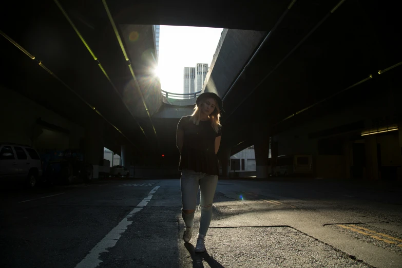 a woman is walking alone on the street