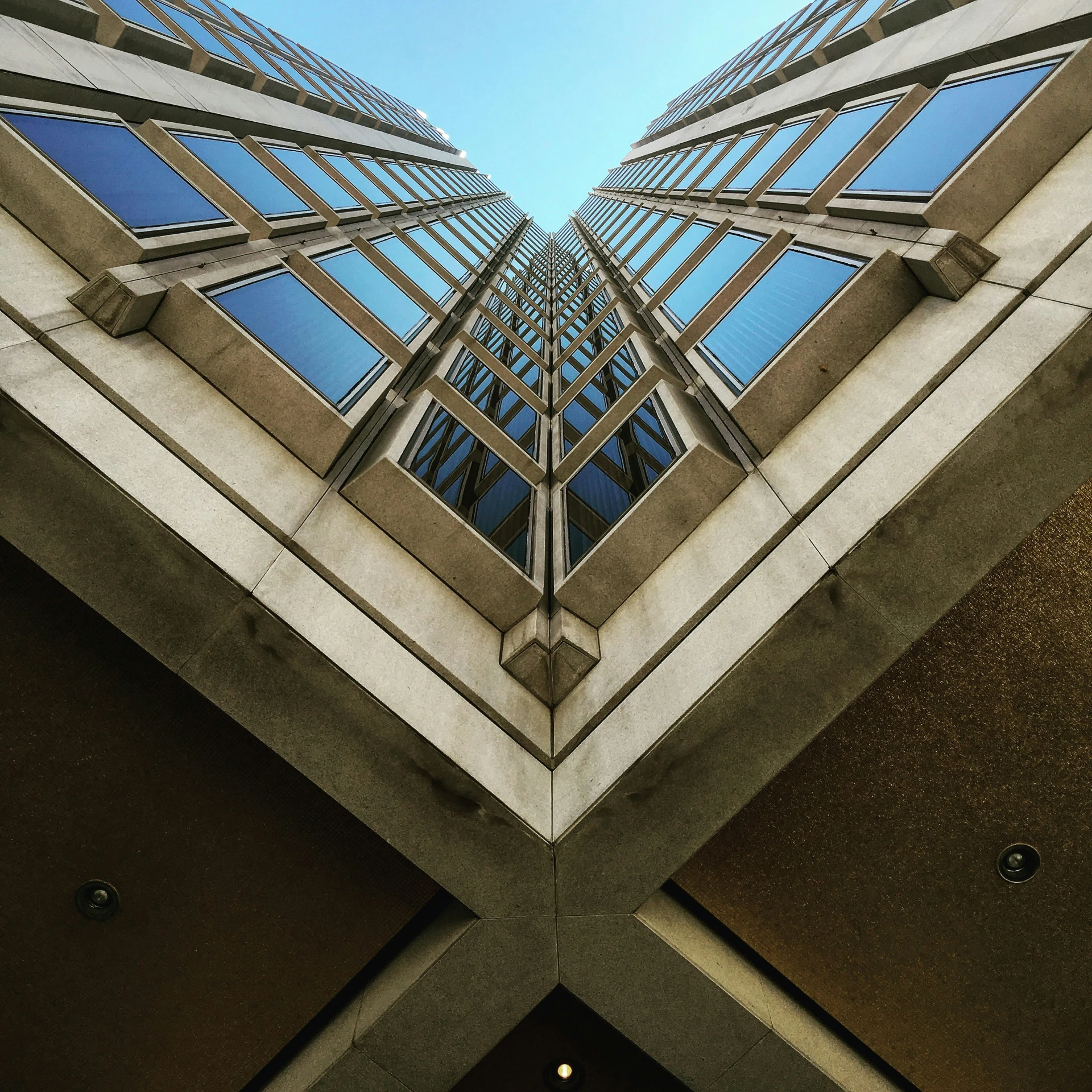 looking up at a tall metal structure that appears to be a tower