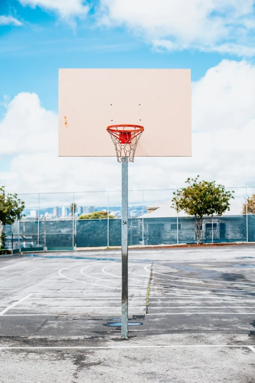 a basketball court with a hole in the middle