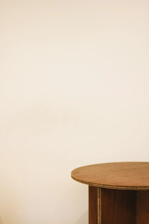 a teddy bear laying on top of a desk