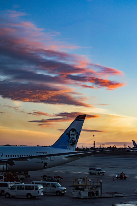 a large commercial plane parked on an airport tarmac