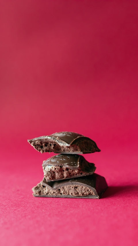 chocolate barkle against a pink background