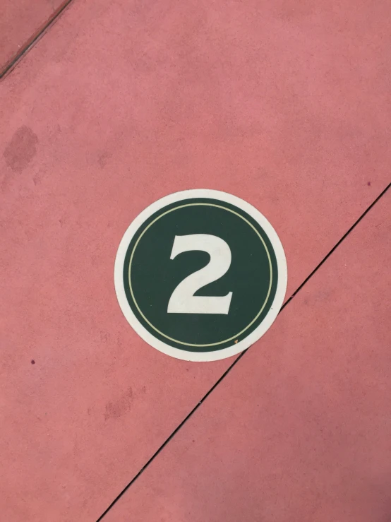 a street sign that is on the ground