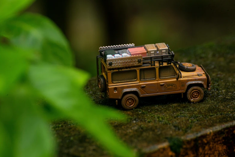 small, toy style model jeep with luggage strapped on top